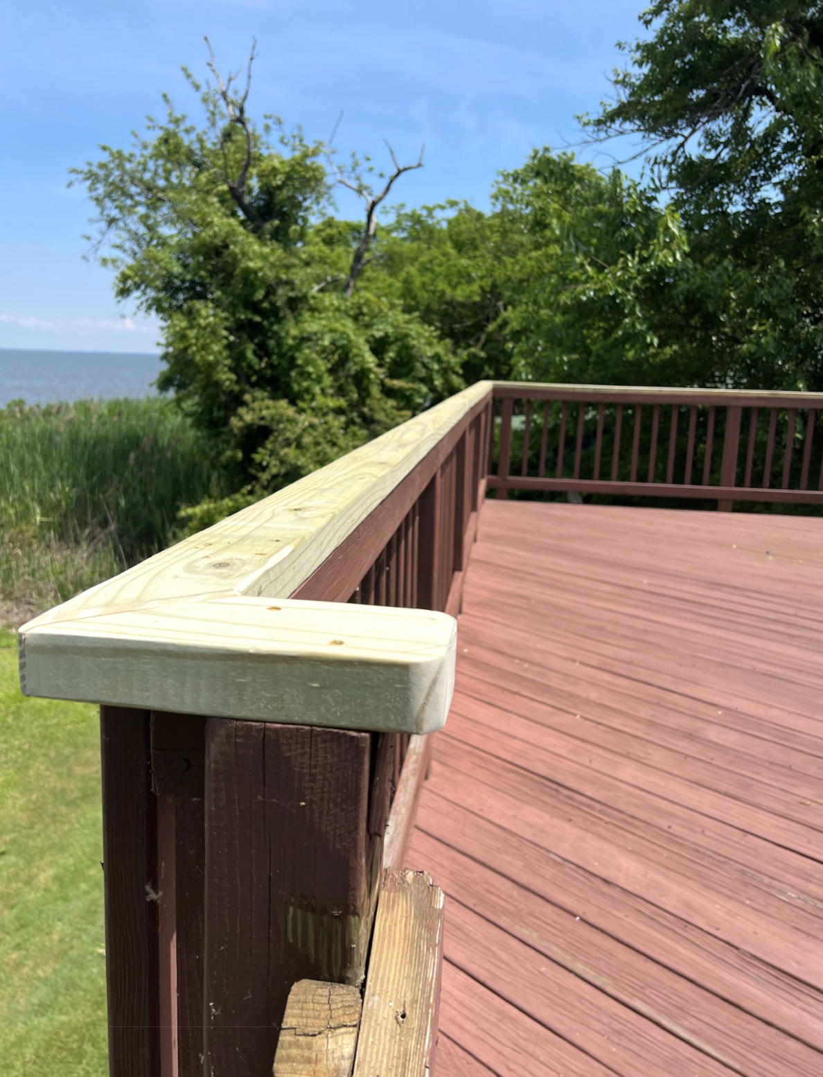Remodeled deck with updated layout and railings