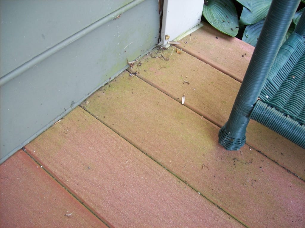 Vinyl/composite deck before pressure washing service