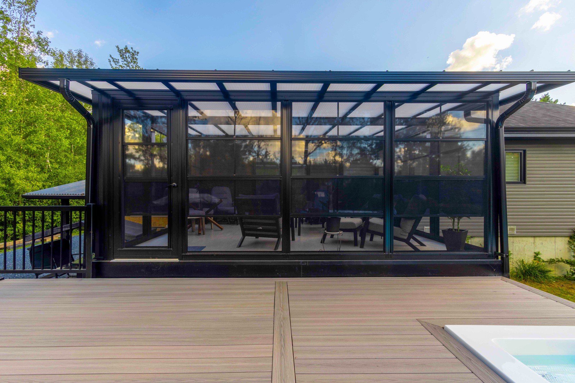 New sunroom built on existing deck structure